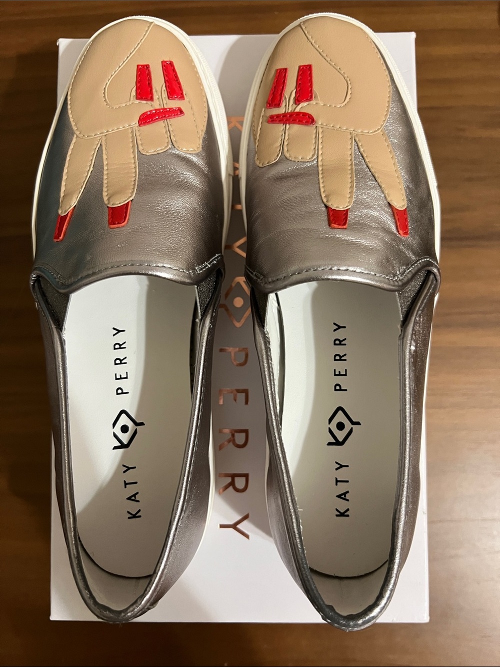 Katy Perry Collections Metallic Silver Slip-On Sneakers with Beige & Red Details - Picture 4 of 11